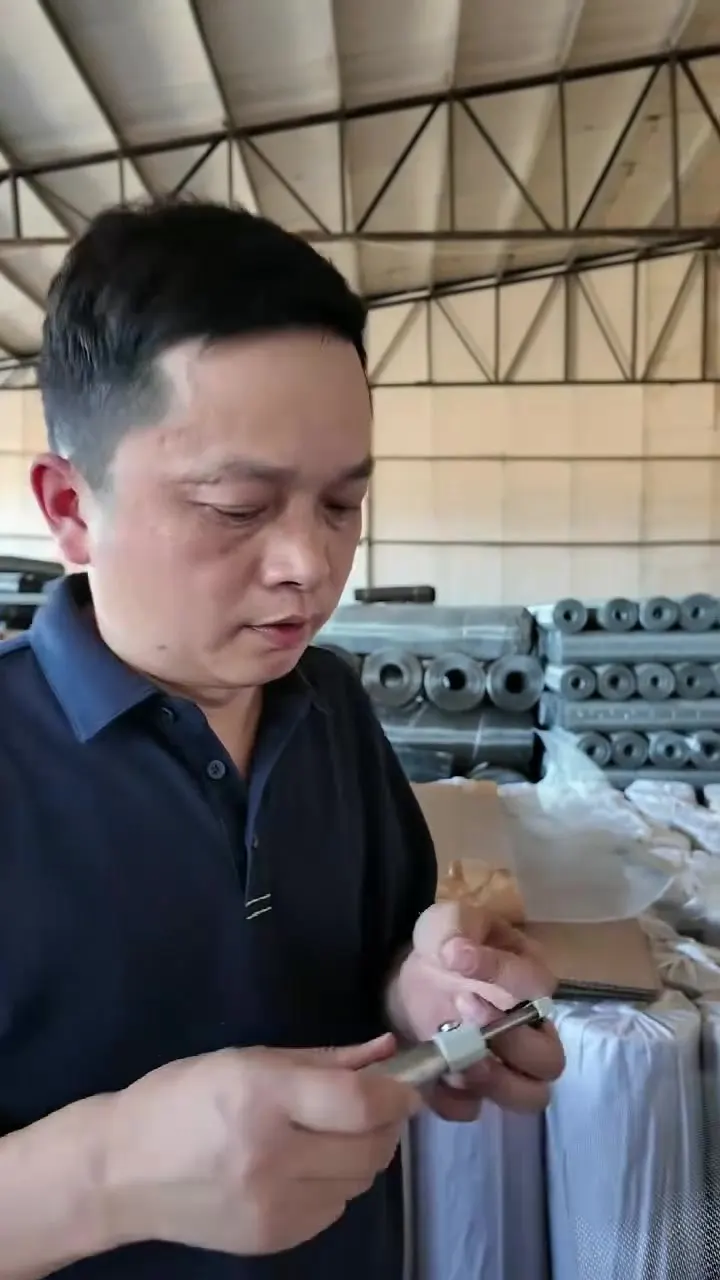 Our inspector checking goods in a factory warehouse